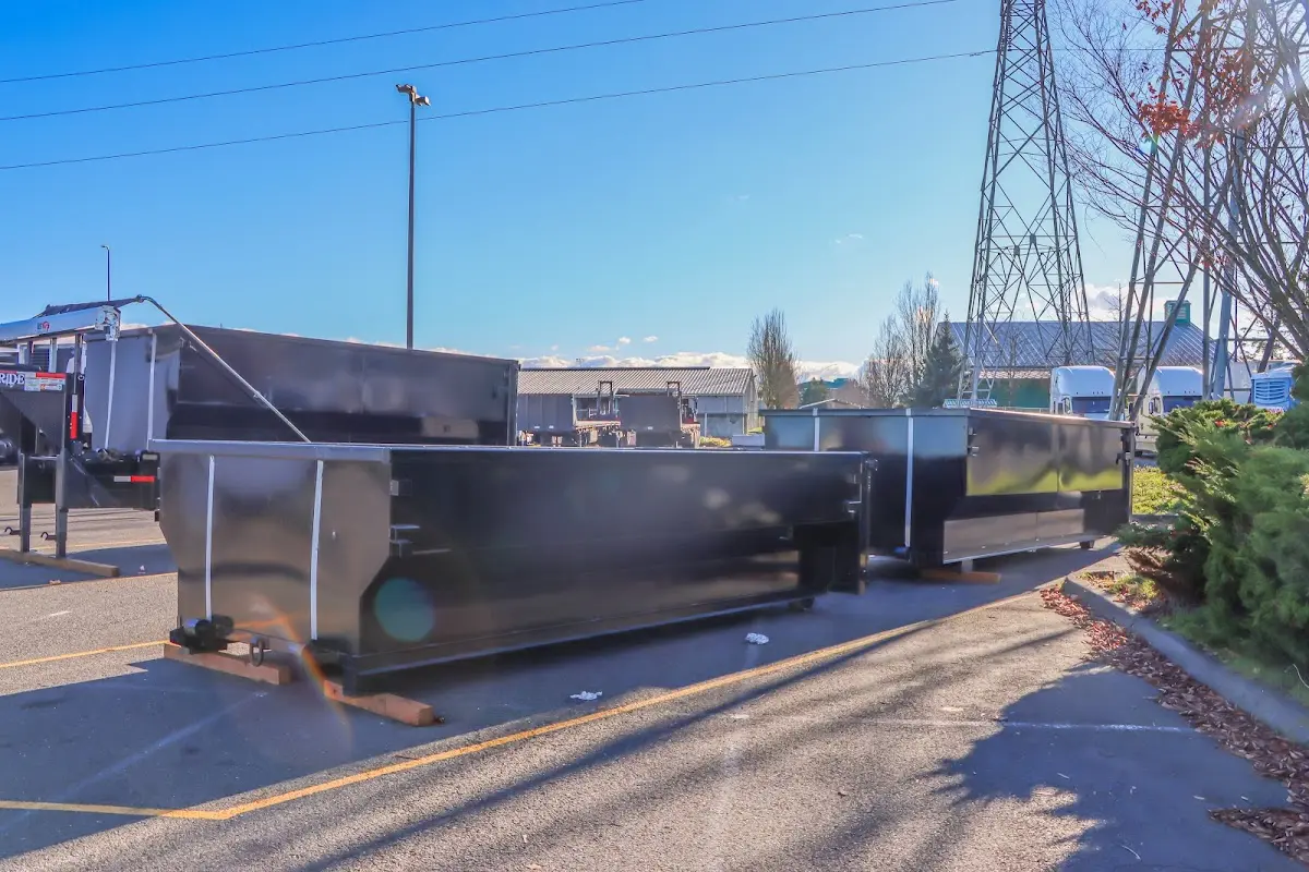 Roll-off dumpster ready for waste disposal at job site for Construction Dumpster Rental in Elm Grove